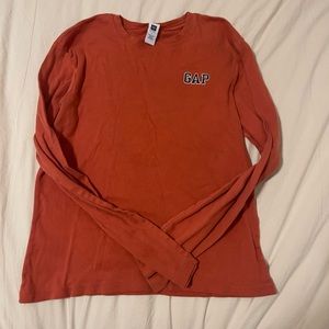 gap long sleeve orange shirt size kids large. fits like a size xs adult